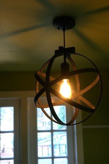 DIY orb pendant light using embroidery or quilting hoops.