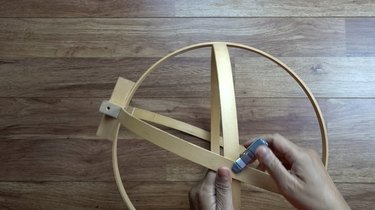 Assembling DIY orb pendant light using embroidery or quilting hoops