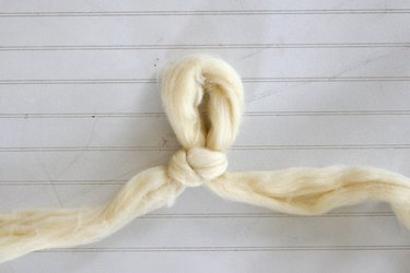 create a knot with a four inch loop