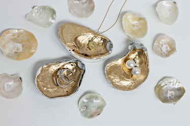 Gilded oyster shells as jewelry holders