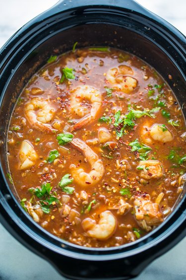 Stir in the seafood and cook for another 45 minutes, or until seafood is cooked through.
