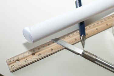 Materials you need to make a cylinder out of a sheet of paper