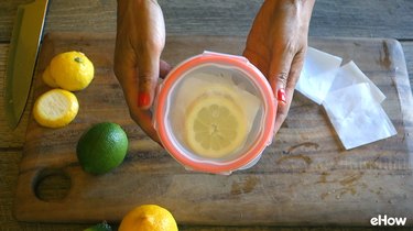 Preparing citrus slices for freezing.
