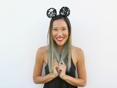 Wearing the lace mouse ears.