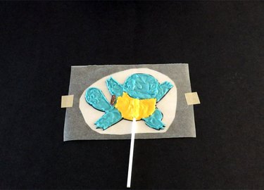 Squirtle with lollipop stick