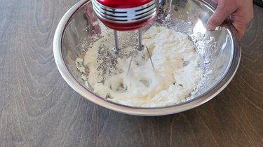Beating cream cheese and powered sugar