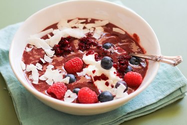 Acai bowl with fresh berries and coconut.