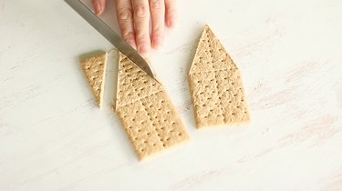 Slicing pointed ends on two crackers