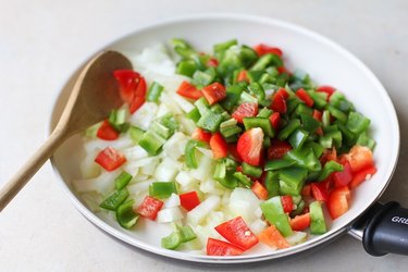 onion and bell pepper in a skillet
