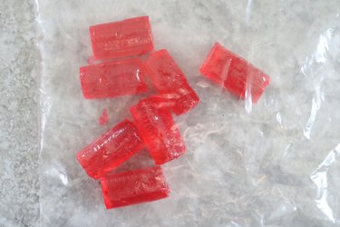 Place Jolly Ranchers in plastic bag