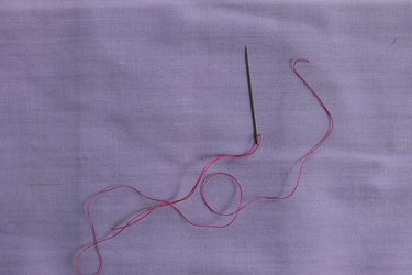 Bringing the needle from back to front in zig zag stitch