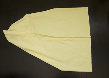 The open seam folded perpendicular to the sewn seam.