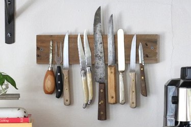 Create a DIY rustic wall rack to display your knives.