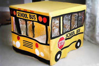 Front of the school bus playhouse.