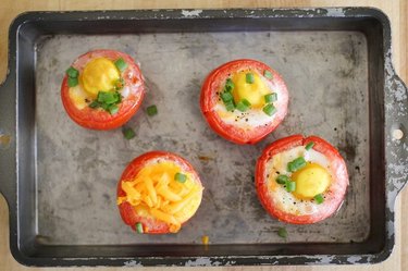 Eggs baked in tomatoes.