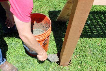 fill hole with concrete until flush with grass