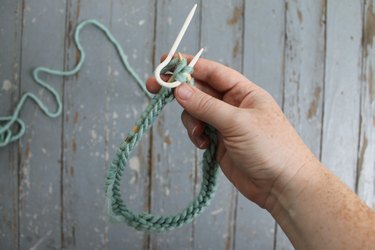 Knitting the stitches from the cable needle