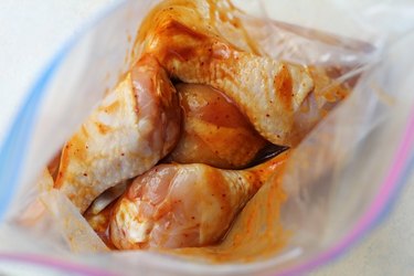 Chicken and marinade in a bag