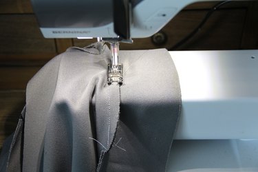 Sew the facing to the seam for secure neckline