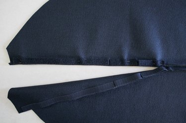 Sew the hook-and-loop tape onto the center back seam.