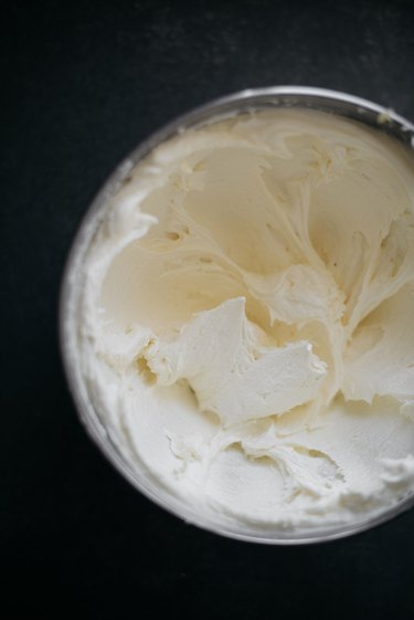 The champagne buttercream will be very pale, thick and fluffy when it is ready.