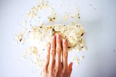 Folding the dough in half.