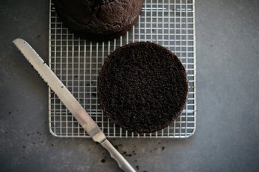 Level the cakes with a serrated knife until they are evenly flat.