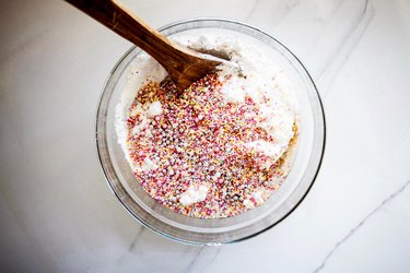 Add in 3/4 cup of sprinkles to the vanilla batter to make  a funfetti cake!