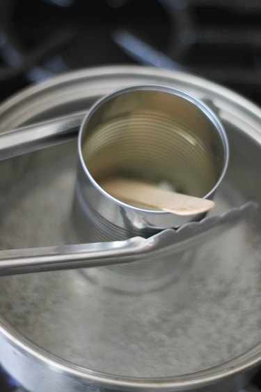 Place wax into can and stir until melted.