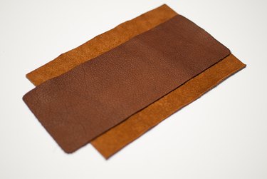 Lay the band over the outside wallet piece.