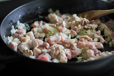 chicken and onion in a skillet