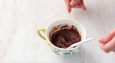 stirring ingredients together to form cake batter