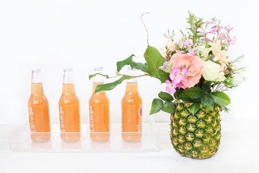 Make a pineapple into a flower vase