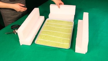 styrofoam blocks around tray of guacamole