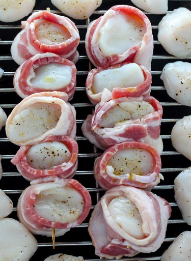 Grilling the scallops.