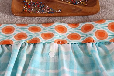 Pin the apron into the waistband