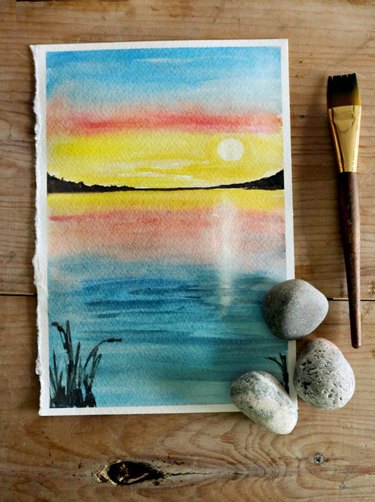 A watercolor of a sunset