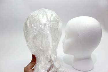 Packing tape ghost head and a foam head