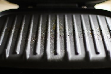 George Foreman Grill coated with cooking spray.