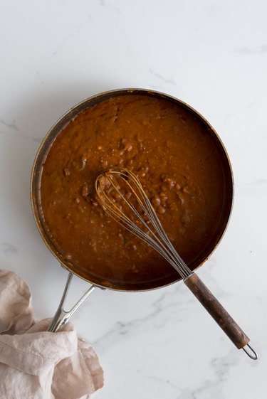 Whisk the sauce until smooth.