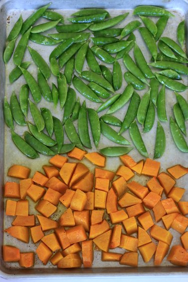peas and squash on the pan