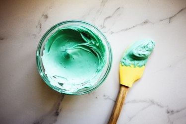 Mix the Green and Blue food coloring until smooth form a beautifully hued shade of Turquoise.