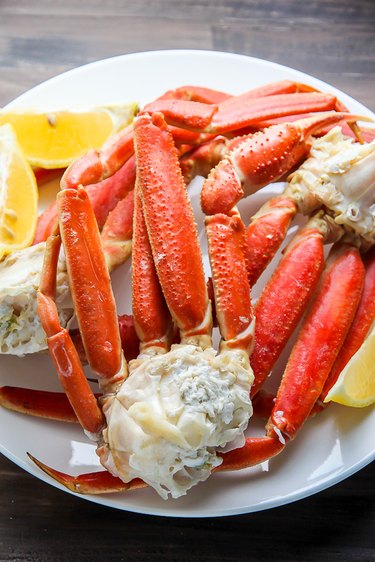 Serve crab legs warm with butter.