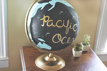 A completed painted globe.