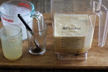 Blender containing coffee ice cream ingredients.