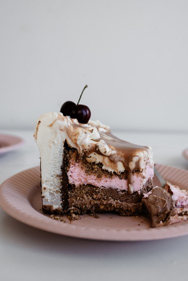 A slice of this Neapolitan ice cream cake is truly delicious!