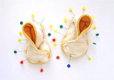 Slippers with lots of pins