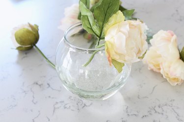 Add flowers to vase with simulated water
