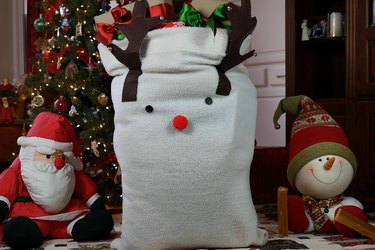 Reindeer Santa bag filled with gifts.