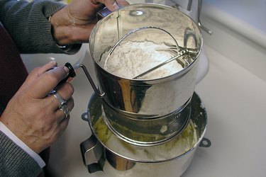 Sifting dry ingredients into the mix
